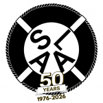 Anniversary logo celebrating 50 years (1976–2026) with crossed oars, a rope border, and a gold '50 Years' badge.